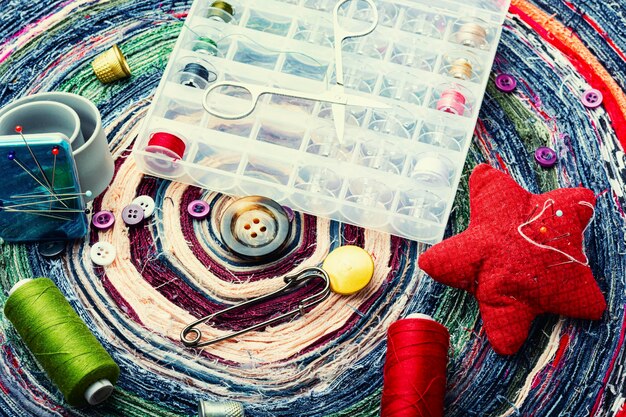 palette of threads and needles